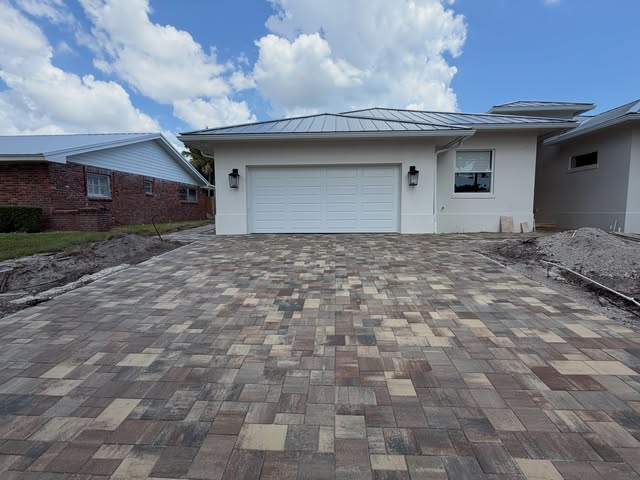 New construction paver driveway installation